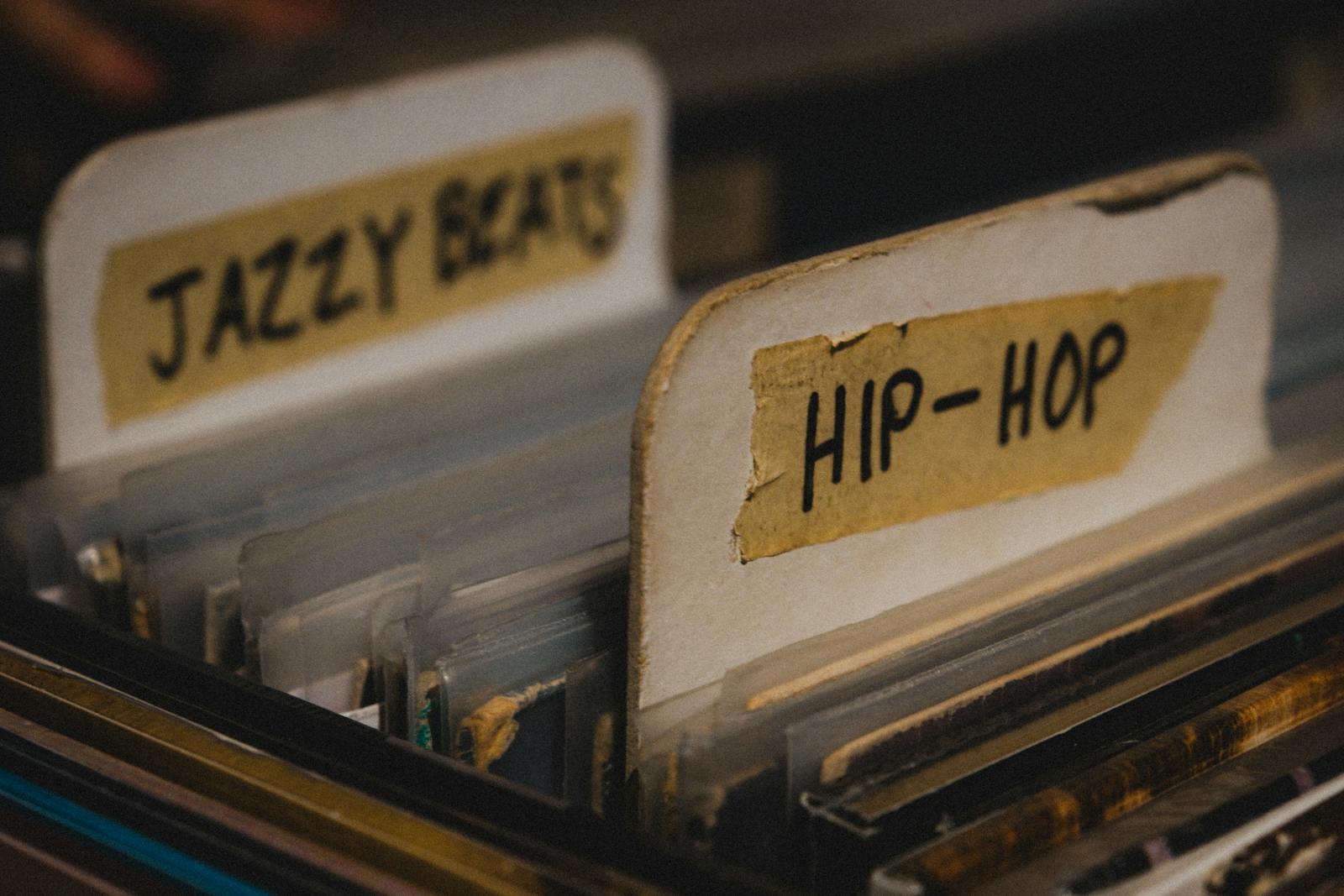 A record player with the words jazzy beats and hip hop