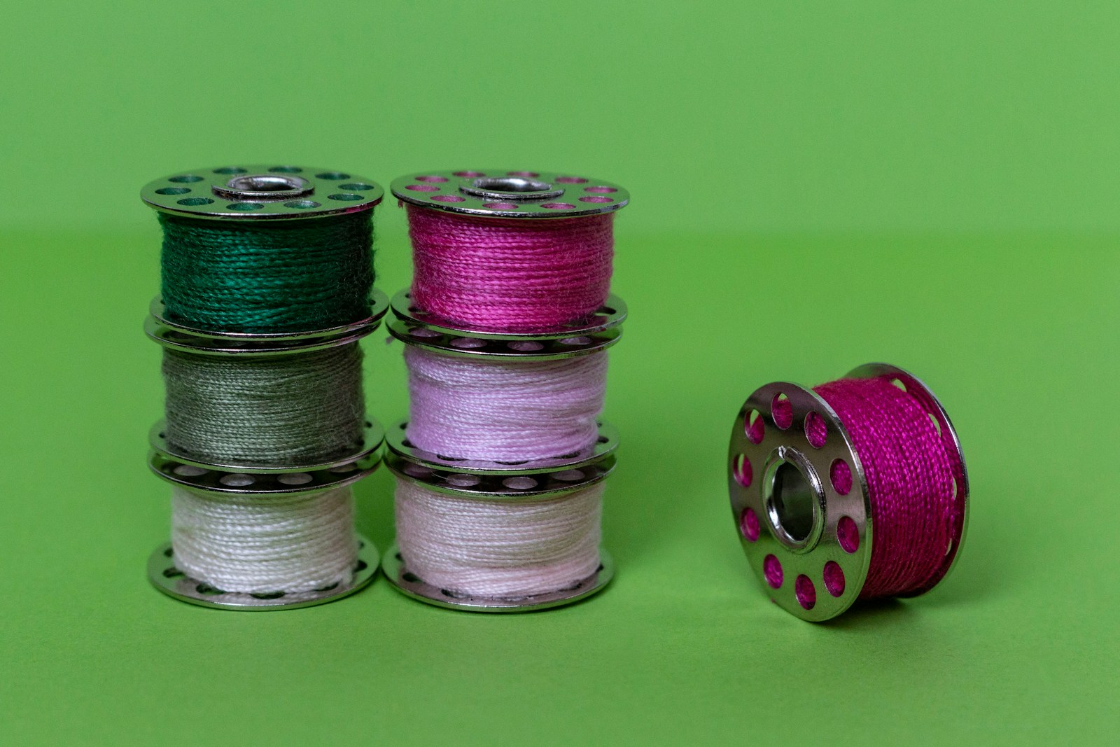 purple green and silver round coins